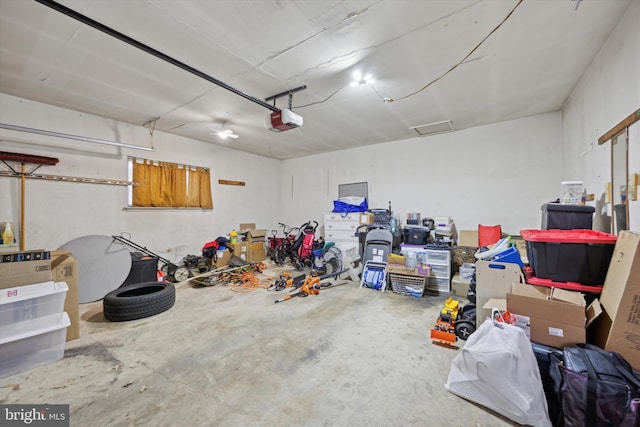 garage featuring a garage door opener