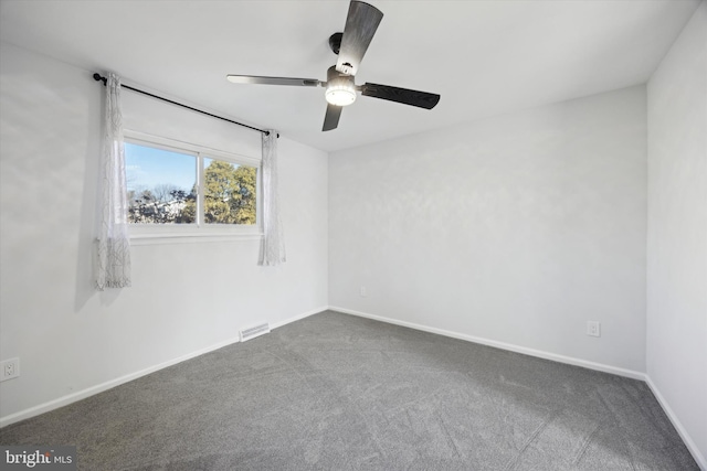 empty room with carpet floors and ceiling fan