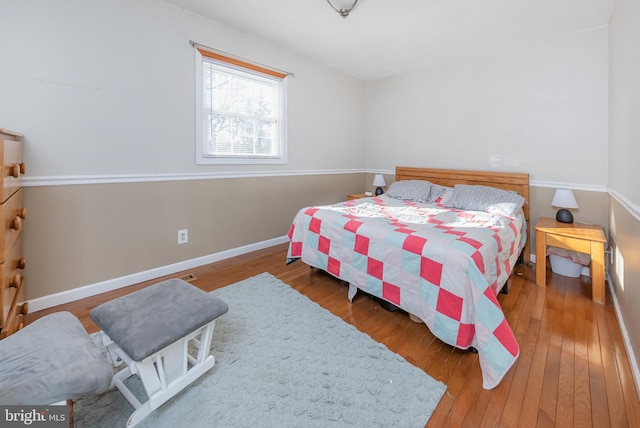 bedroom featuring wood-type flooring