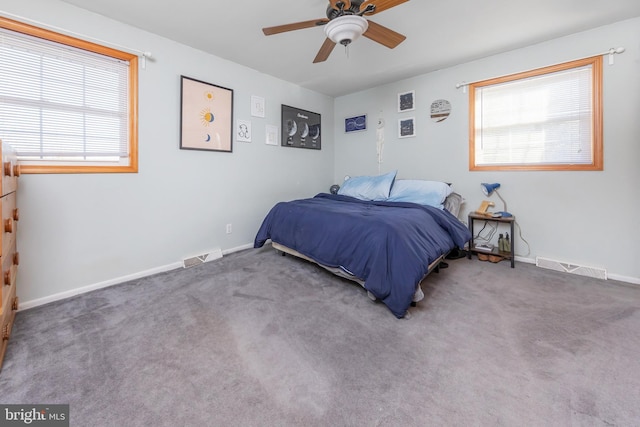 carpeted bedroom with ceiling fan