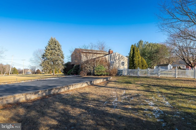 exterior space featuring a lawn