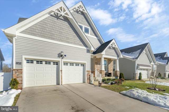 craftsman-style home with a garage