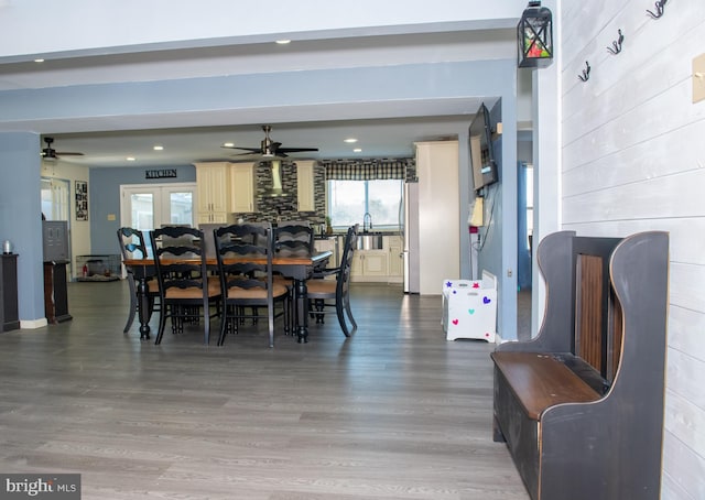 dining space featuring recessed lighting, ceiling fan, and wood finished floors