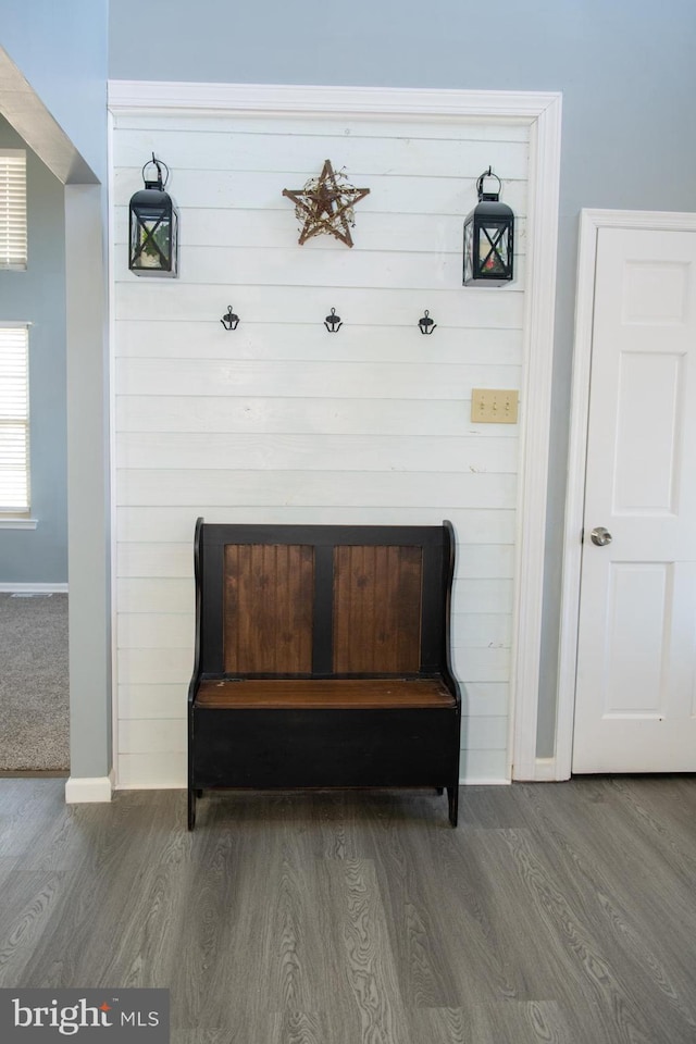 living area featuring dark wood-style floors and baseboards