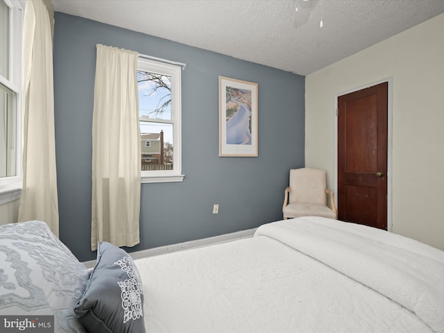 bedroom featuring a textured ceiling