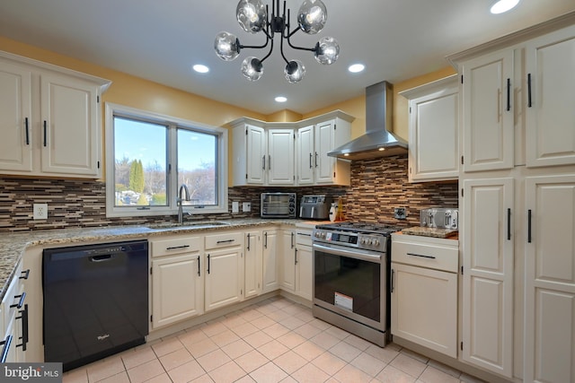 kitchen with sink, dishwasher, white cabinets, stainless steel range with gas cooktop, and wall chimney exhaust hood