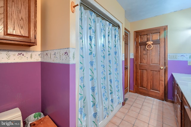 bathroom with vanity and tile patterned floors