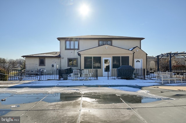 view of front of house featuring a pergola