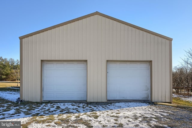 view of snow covered garage