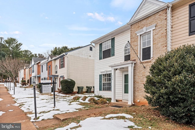 view of snow covered property