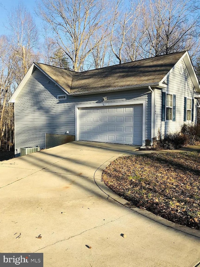 view of property exterior featuring a garage