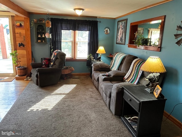 carpeted living room featuring crown molding