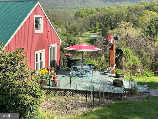 exterior space featuring a yard and a deck