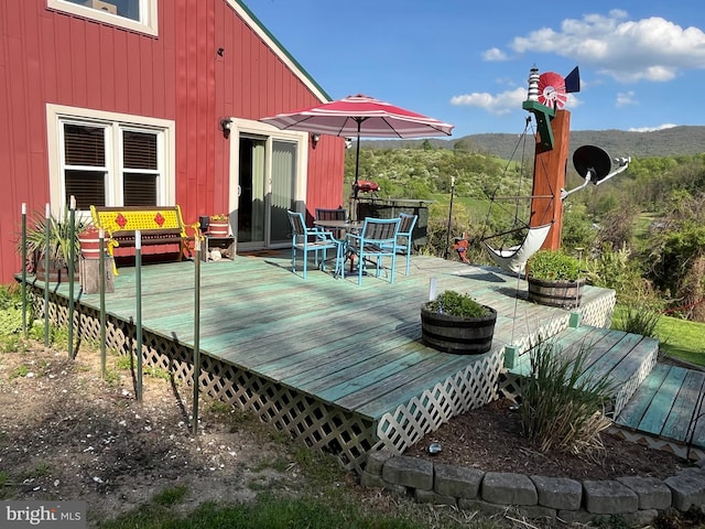 deck with a mountain view