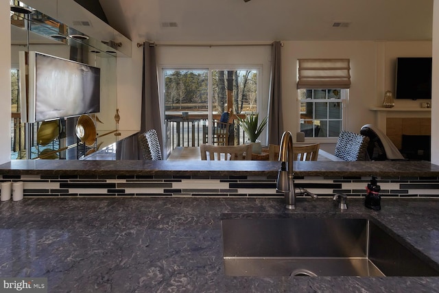 kitchen with sink and decorative backsplash