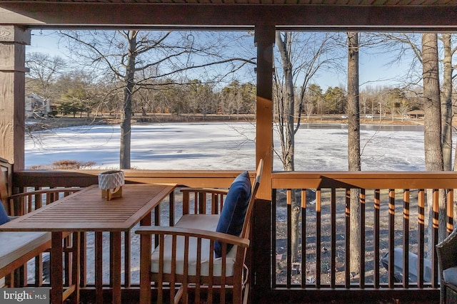 view of snow covered deck