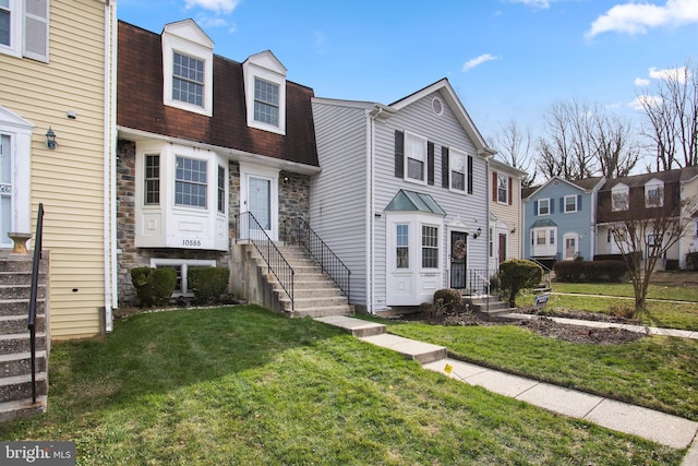 view of property with a front lawn