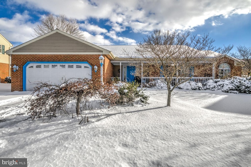 single story home featuring a garage