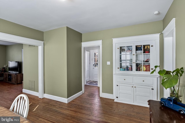 dining room featuring dark hardwood / wood-style floors