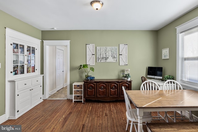 office space with dark wood-type flooring and a wealth of natural light