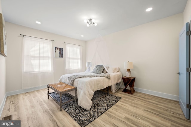 bedroom with light wood-type flooring