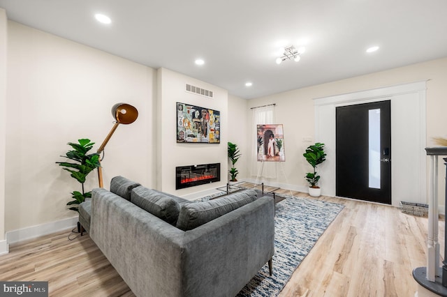 living room with hardwood / wood-style flooring