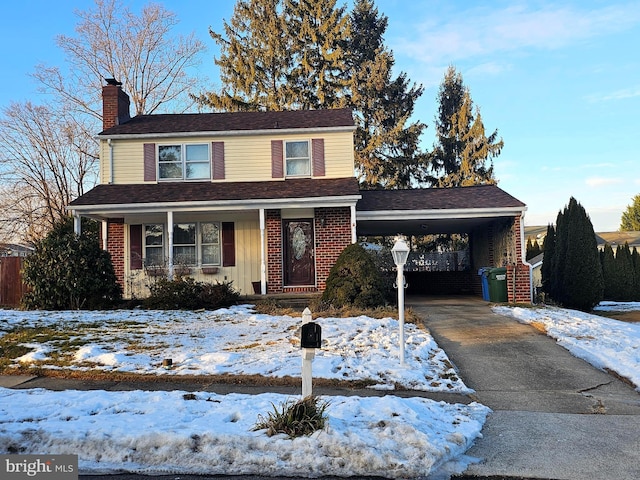 front facade with a carport