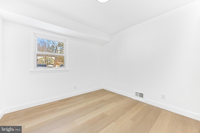 empty room featuring light hardwood / wood-style floors