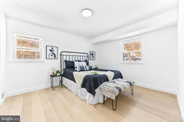 bedroom featuring light wood-type flooring