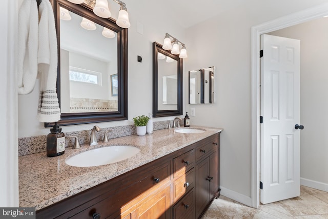 bathroom with vanity and tile patterned floors