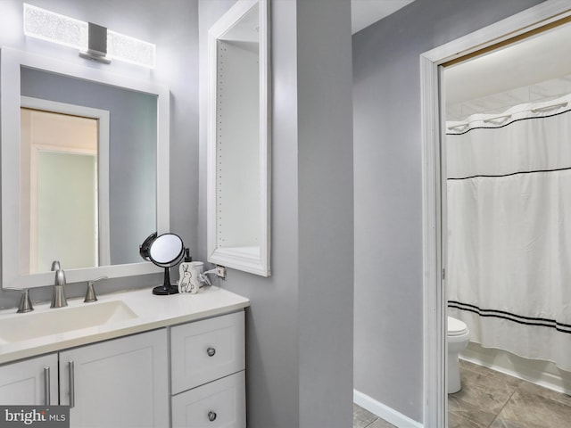 8387 Revelation Ave, Walkersville, MD 21793 - bathroom featuring a shower with shower curtain, baseboards, toilet, and vanity