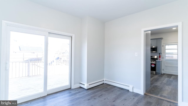 interior space featuring a baseboard radiator and dark hardwood / wood-style flooring