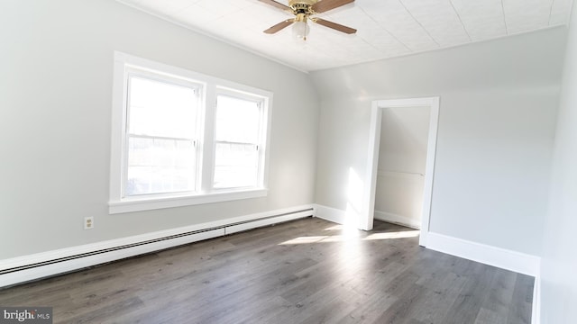 unfurnished room featuring ceiling fan, dark hardwood / wood-style flooring, lofted ceiling, and a baseboard heating unit