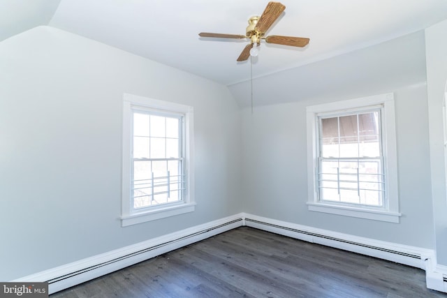 unfurnished room with baseboard heating, ceiling fan, vaulted ceiling, and wood-type flooring