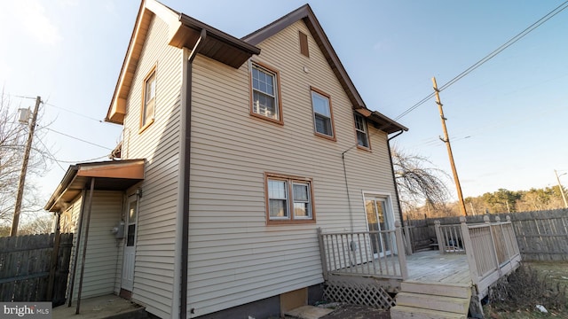 rear view of property with a deck