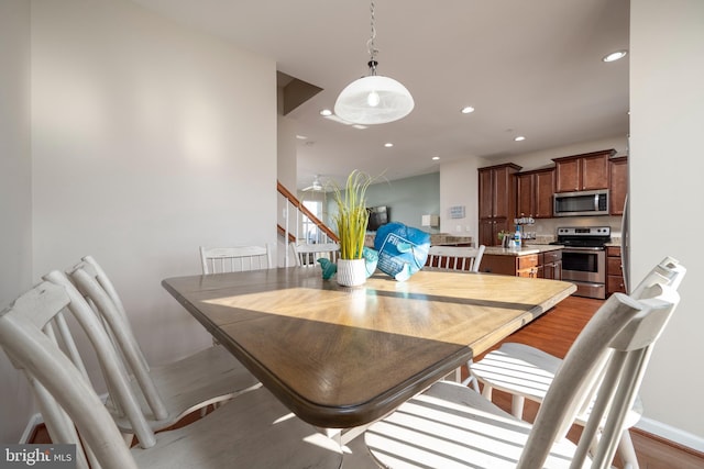 dining room featuring light hardwood / wood-style flooring