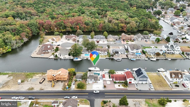 drone / aerial view featuring a water view