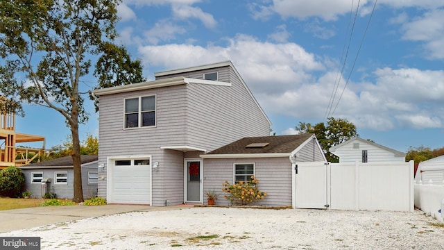 front of property featuring a garage