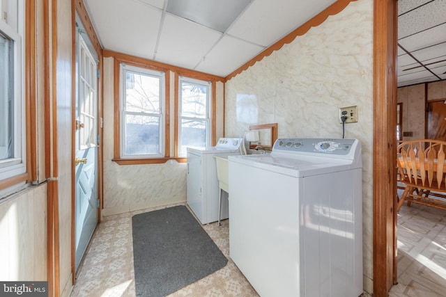 laundry room with washer and clothes dryer