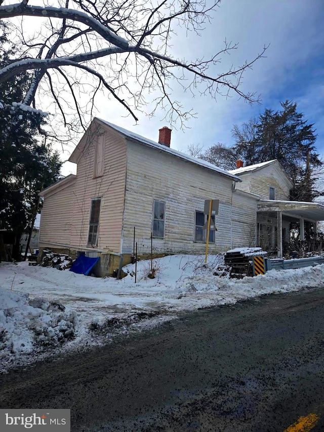 view of snow covered property