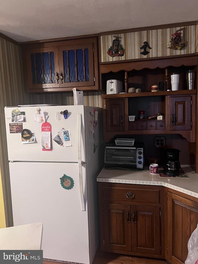 kitchen featuring white refrigerator