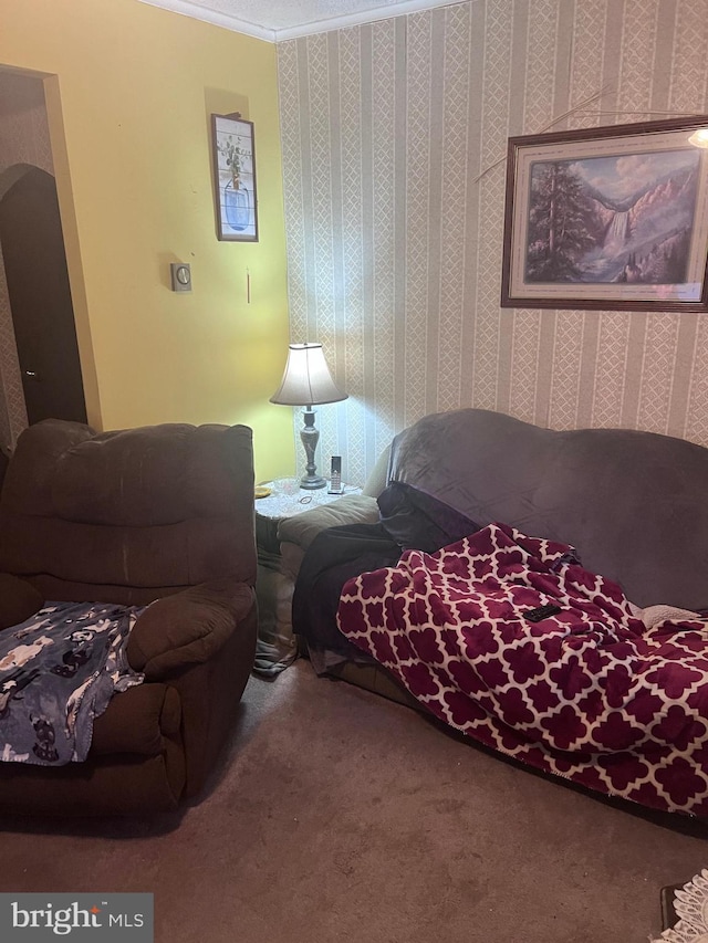 bedroom featuring crown molding and carpet flooring