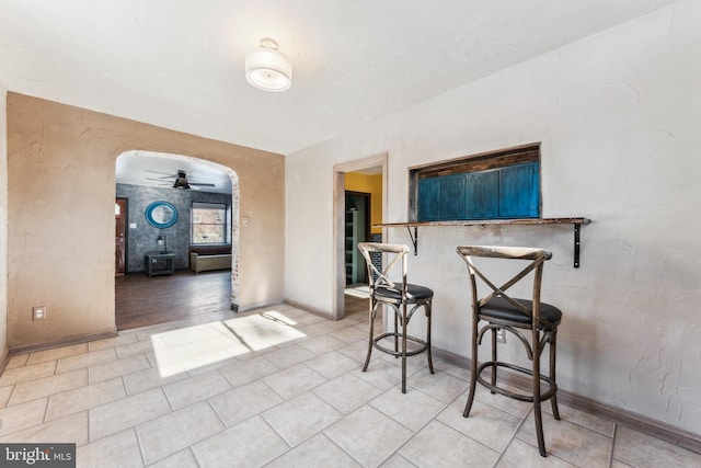 dining space with ceiling fan