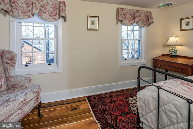 bedroom featuring wood-type flooring