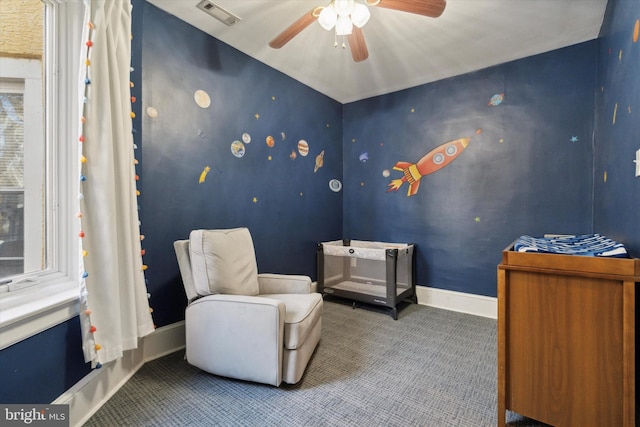 tiled bedroom with ceiling fan