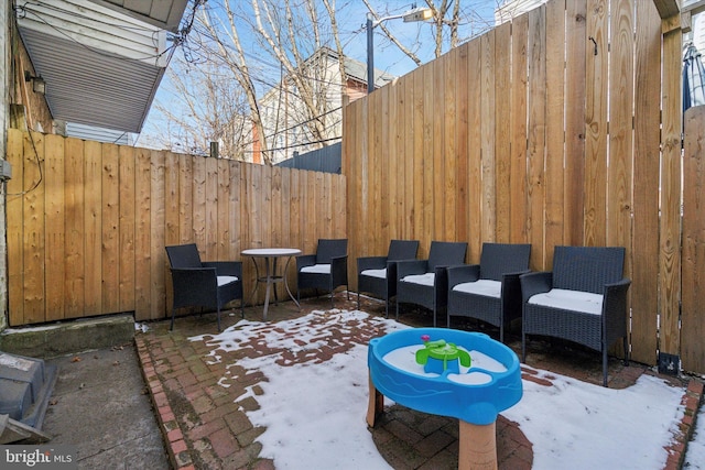 view of snow covered patio