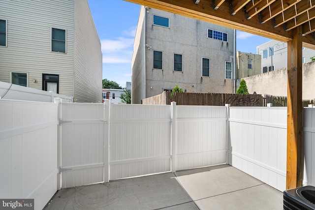 view of patio with central AC unit