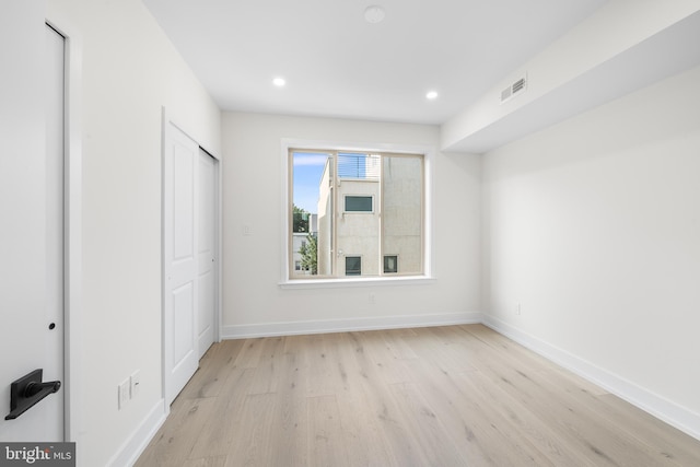 unfurnished bedroom with light hardwood / wood-style floors