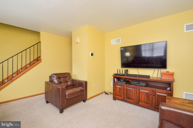 living room featuring light colored carpet