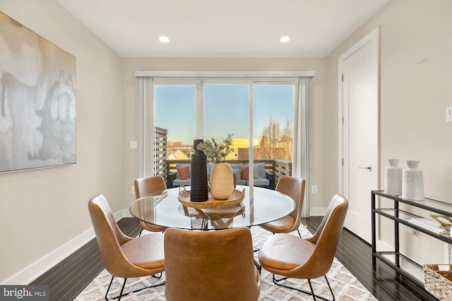 dining area with wood-type flooring